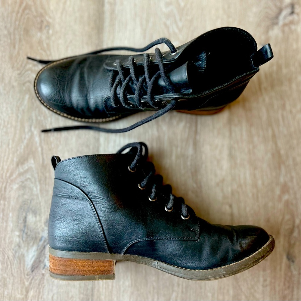 “Not Rated” (brand) black faux-leather lace-up booties with ~1 inch heel